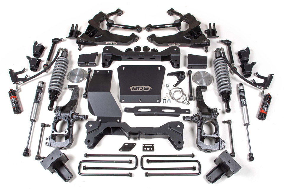 The components of a lift kit, spread out on a table